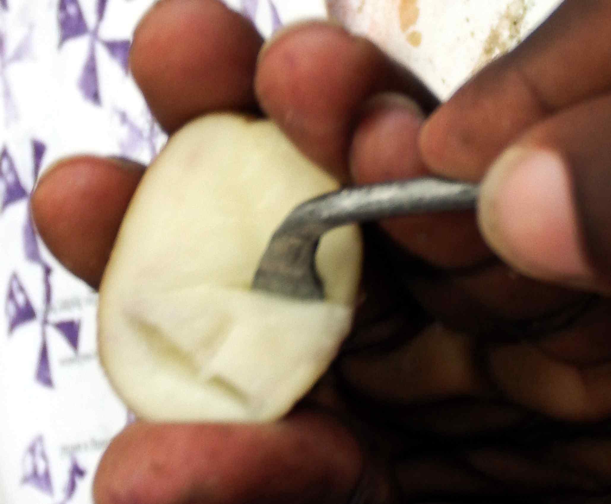 carving a  potato forprinting