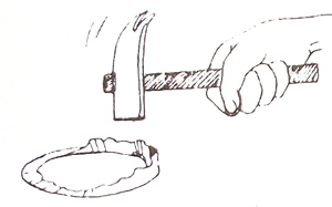 hamering the bottle top